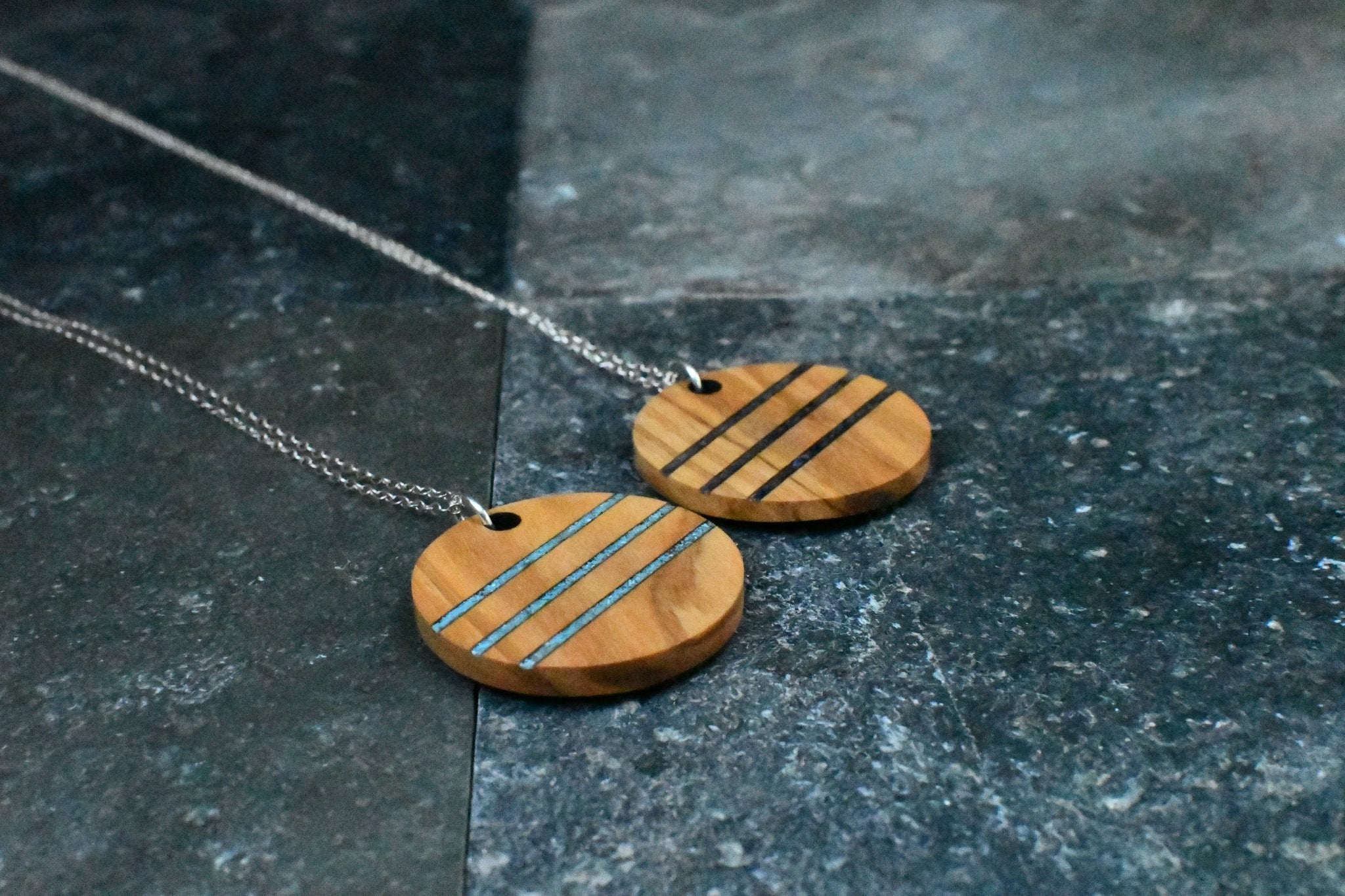 Handcrafted wooden jewelry collection by PRWMade featuring earrings necklaces and keychains in walnut maple and exotic hardwoods