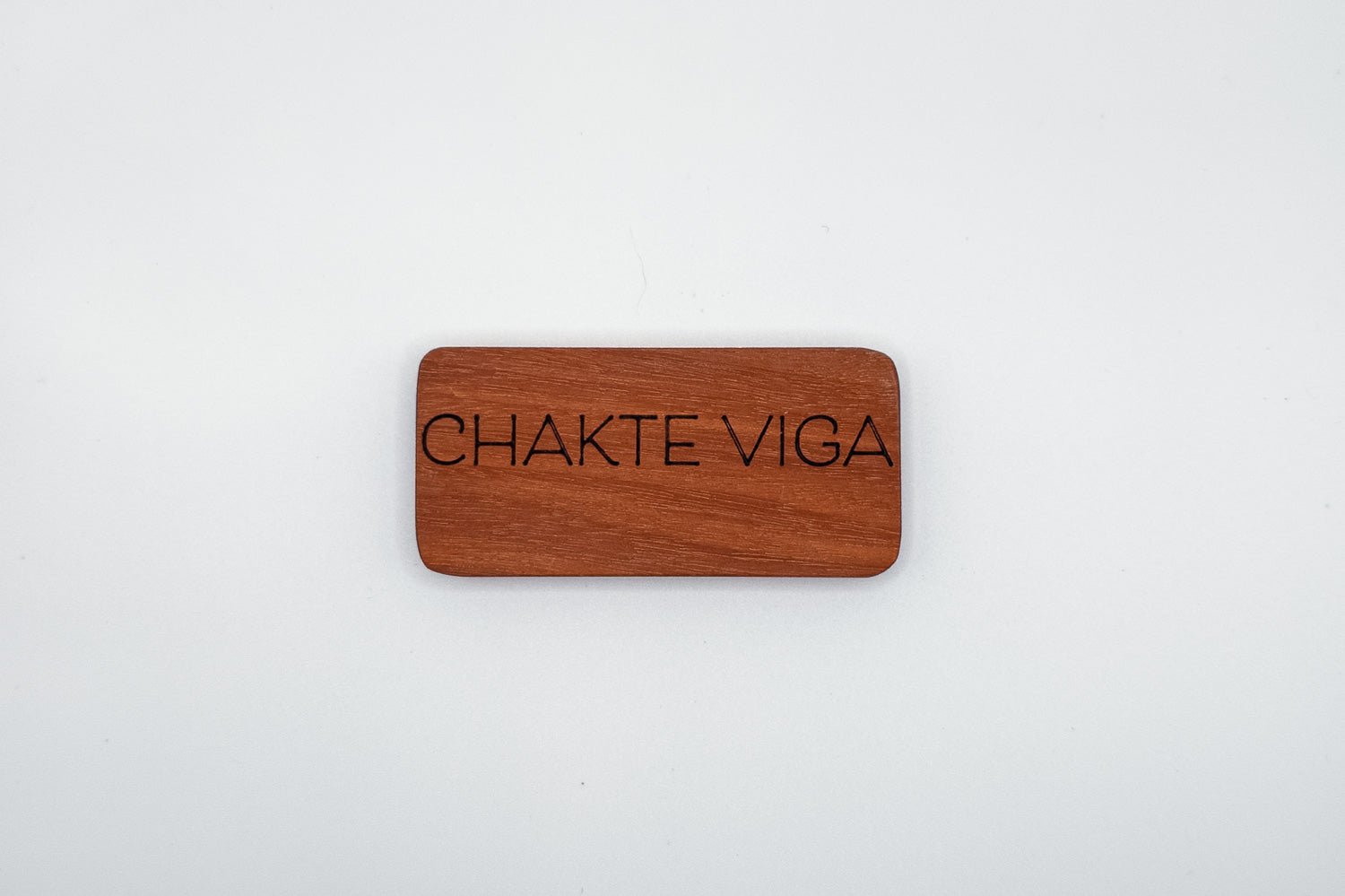 Chakte Viga wood jewelry by PRWMade featuring warm sunset-orange tones from Central American hardwood