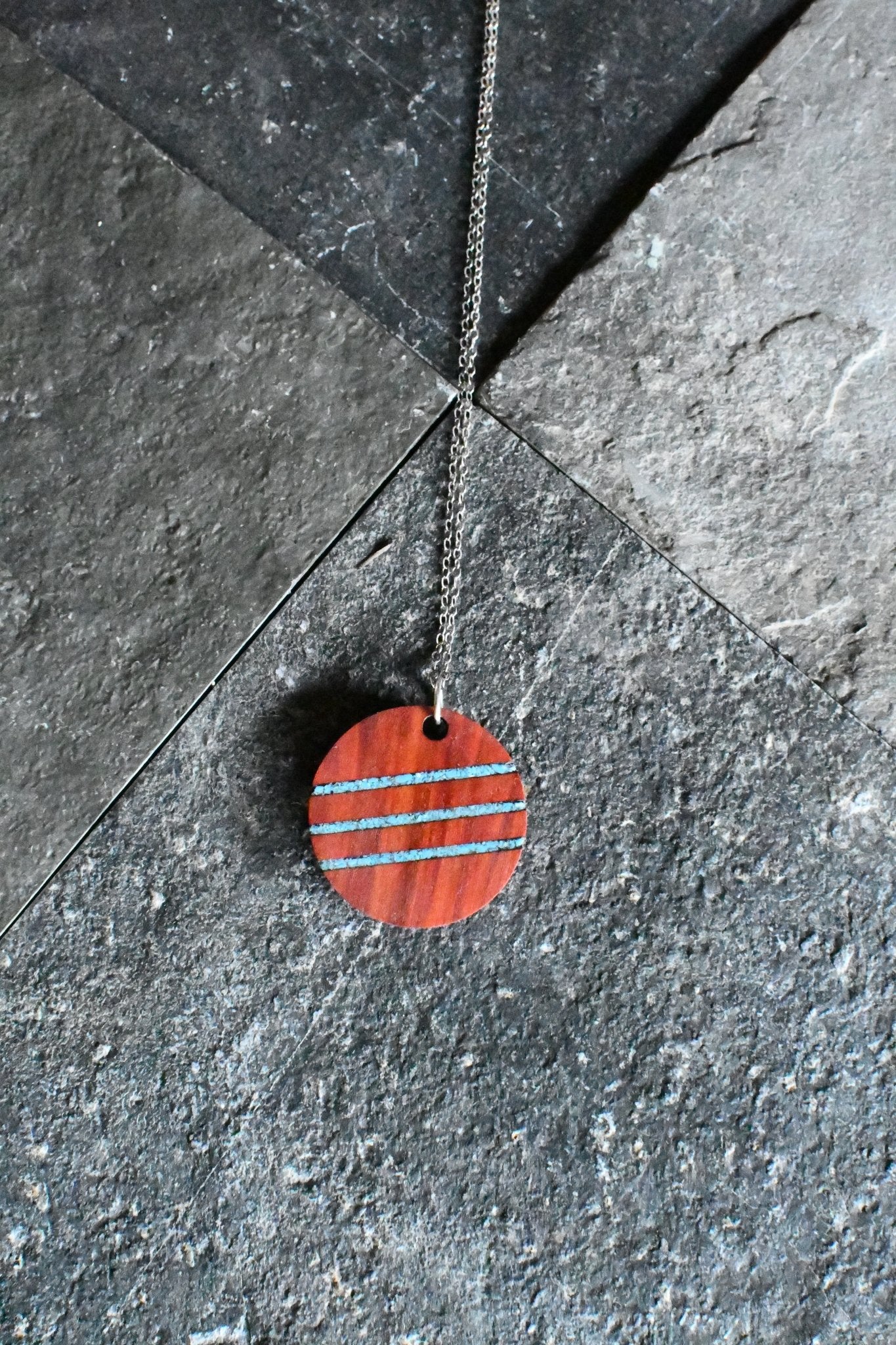 Handcrafted wooden jewelry and gifts displayed on a natural wood surface | PRWMade