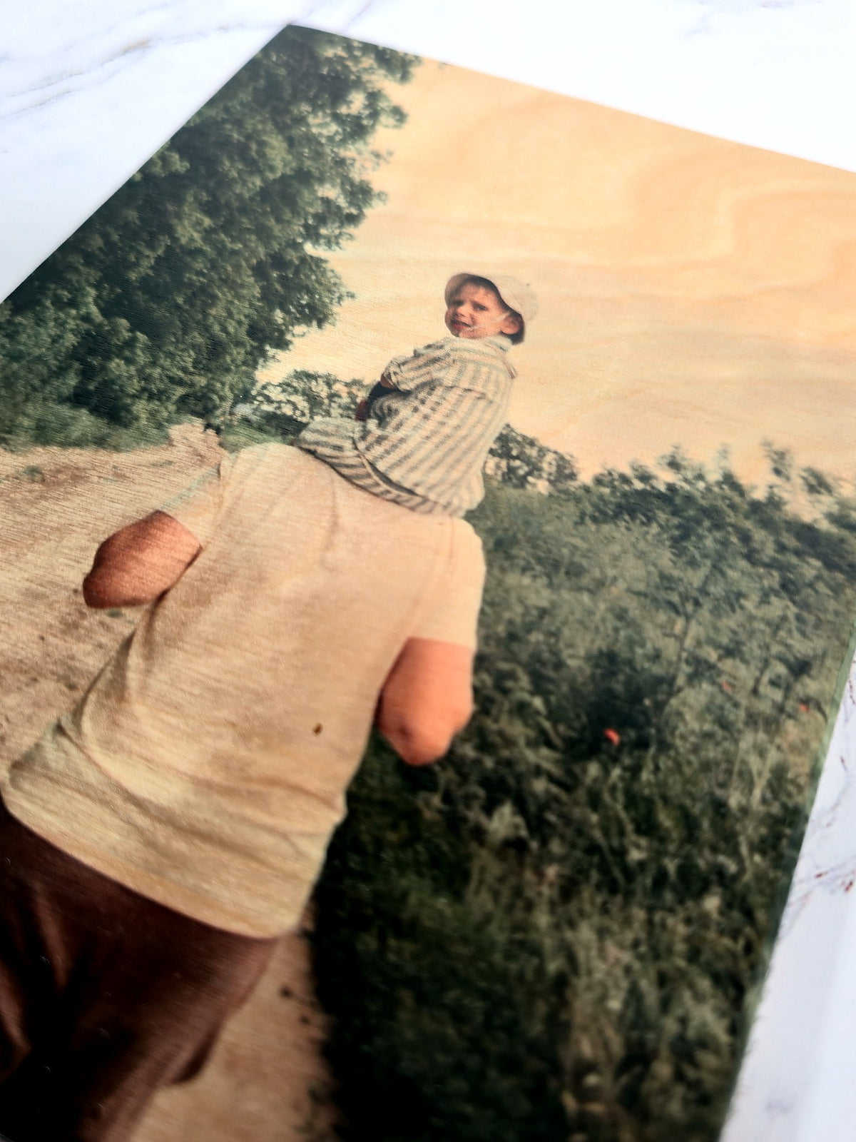 Alt-angle detail of Natural Base finish on 11x14 Custom Photo Print on Wood (5x7 sample shown)