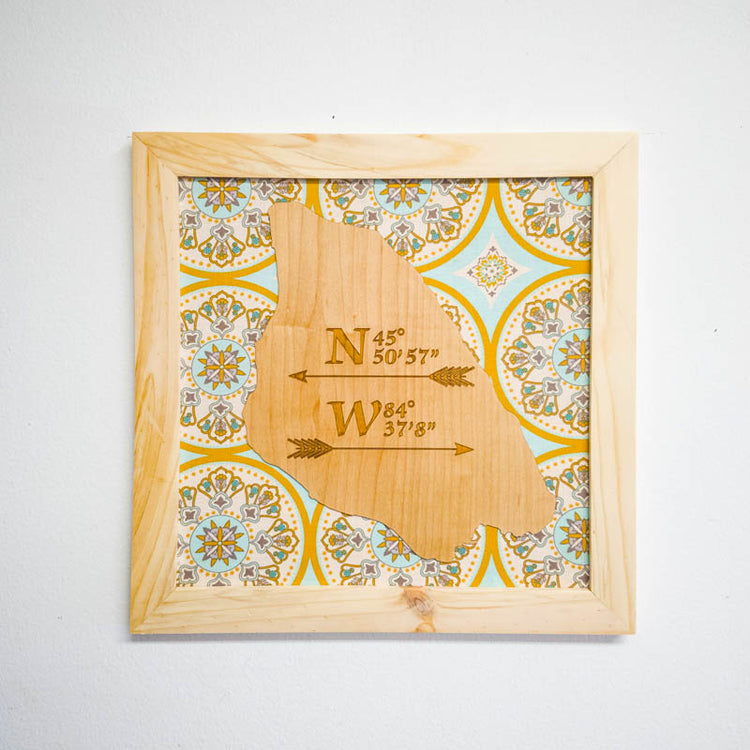 Personalized coordinates wall art with laser-engraved latitude and longitude on hand-cut wood frame