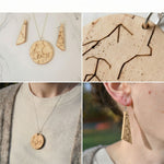 Personalized star-chart necklace made from olivewood, round pendant with engraved constellations; shown outdoors with mountain designs.