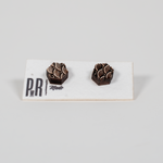 Geometric wood stud earrings with detailed laser-engraved patterns, natural finish, displayed on a white PRW Made card.