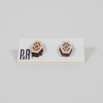 Hexagonal wood stud earrings with black geometric engraving, hypoallergenic posts, displayed on a PRW Made white card.