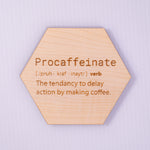Hexagonal wooden sign with the word 'Procaffeinate' and its definition on a light purple background