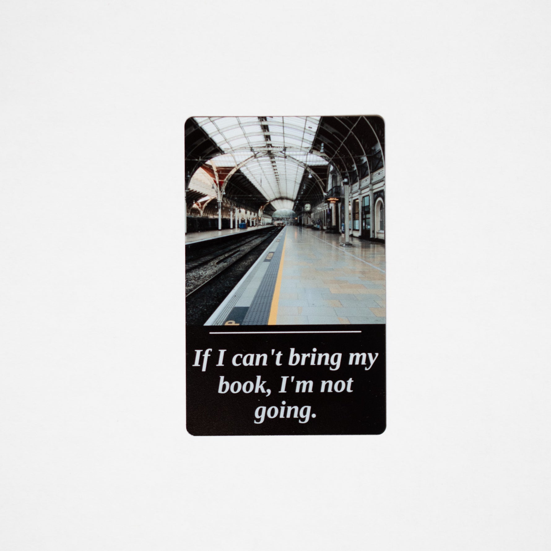 If I Can't Bring My Book metal bookmark on black aluminum, railway station photo