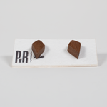 Fire Wood Stud Earrings—two small, brown geometric wood studs on card; handcrafted, hypoallergenic, laser-engraved finish.
