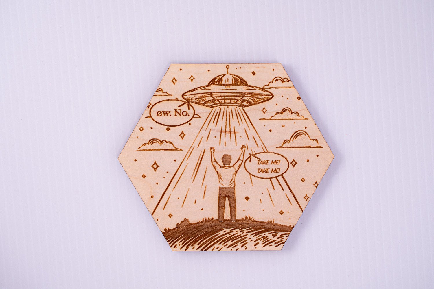 Beam Me Up wood coaster, laser-engraved sci-fi alien design on Maple with cork backing