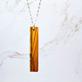 Stone inlay bar necklace in Walnut with crushed stone accent, sterling silver chain