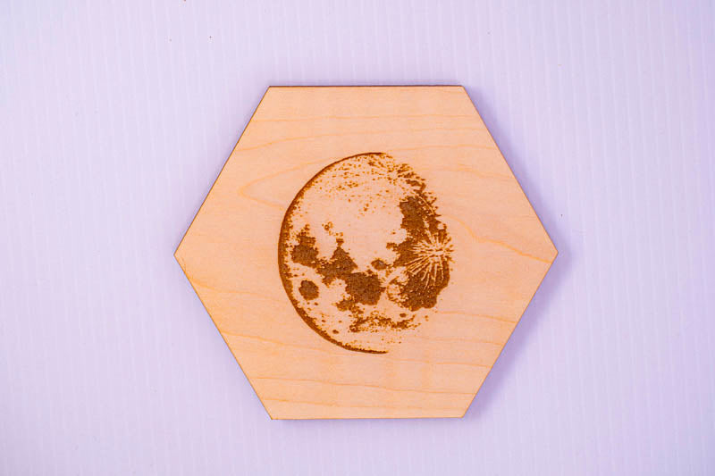 Maple hexagon moon phase coaster with detailed full moon laser engraving
