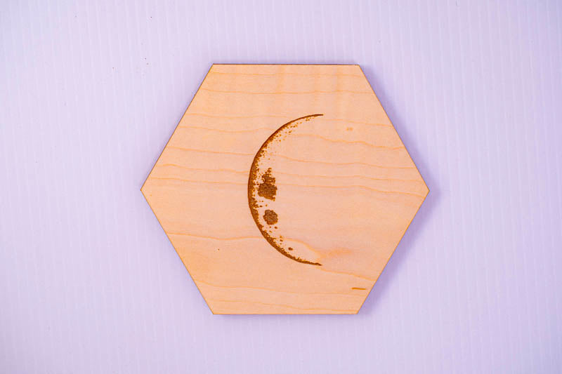 Maple hexagon coaster with laser-engraved waning crescent moon by PRWMade
