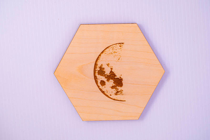 Maple hexagon coaster engraved with a waxing crescent moon, handmade wooden drink coaster