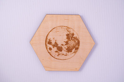 Moon phase wood coaster set, laser-engraved lunar cycle on Walnut with cork backing