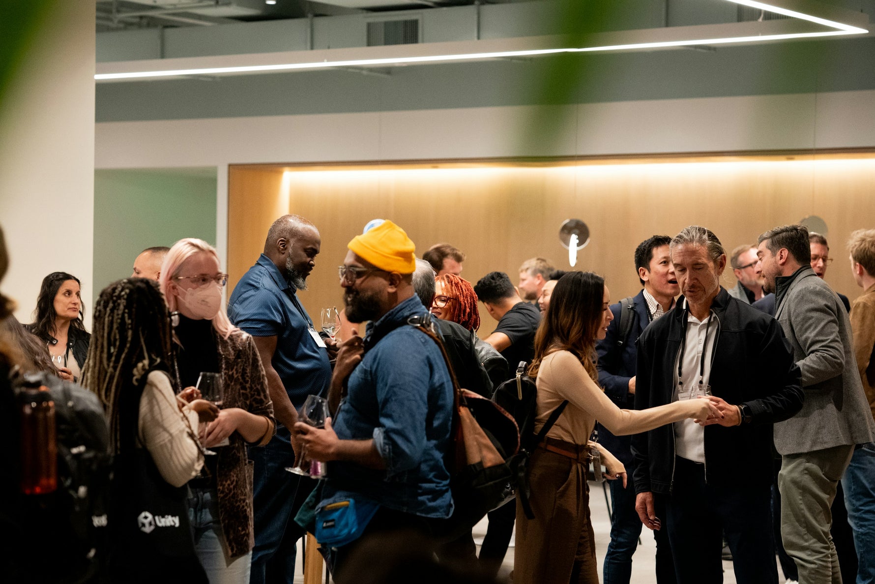 PRWMade Live placeholder - corporate event mingling warm light