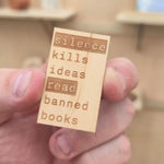 Silence kills ideas read banned books maple wood sticker typewriter style